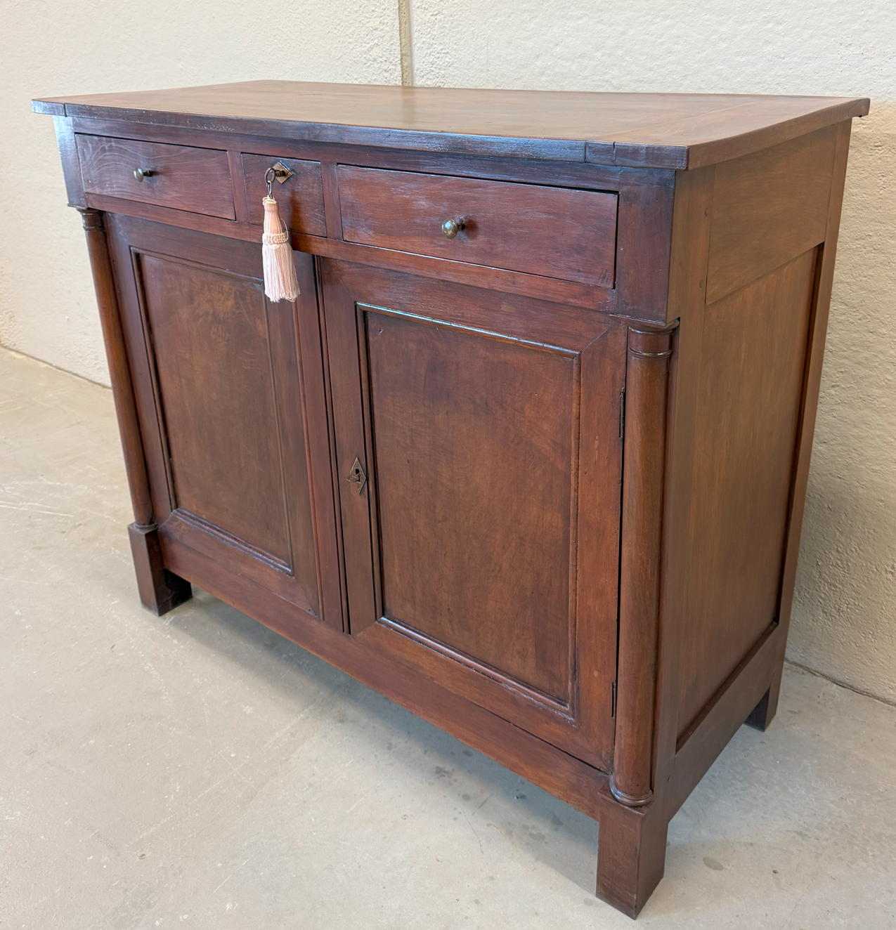 Credenza due ante epoca Impero in noce - Restaurata